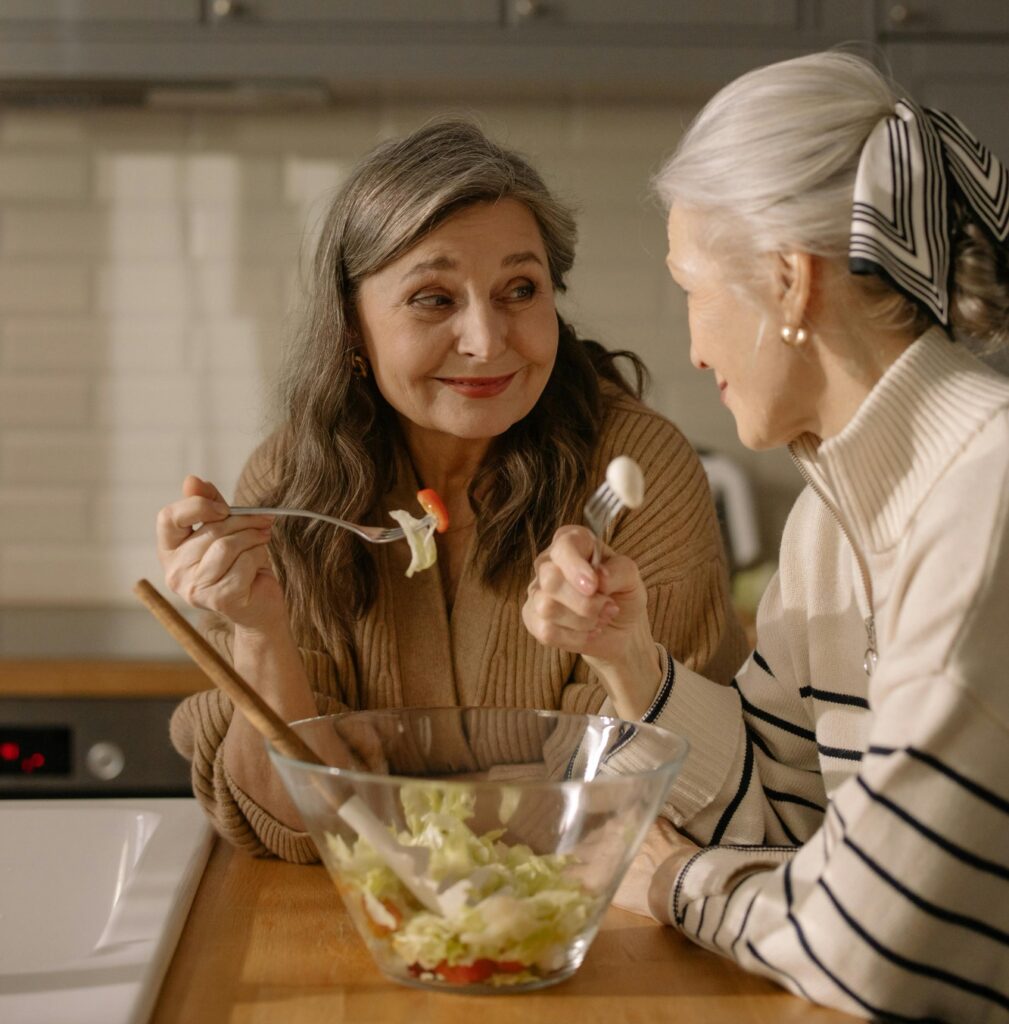 senior eating salad