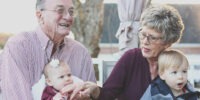 seniors with their grand children