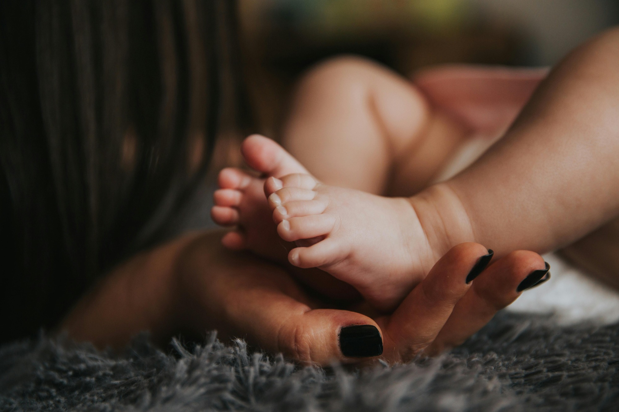momma holding chubby baby, close up of chubby baby feet