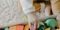 child playing on a clean carpet