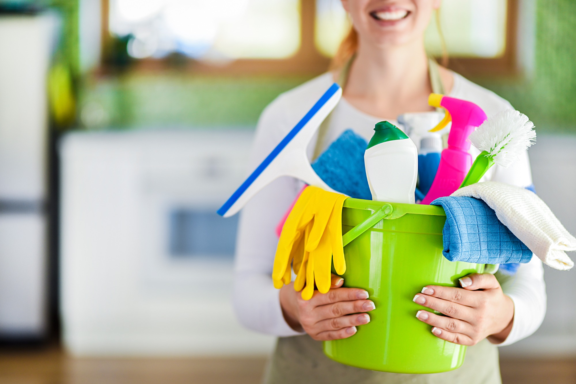 tidybirdcleaning, house cleaner holding cleaning supplies