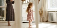 Mom and daughter playing in a clean living room - tidybirdcleaning